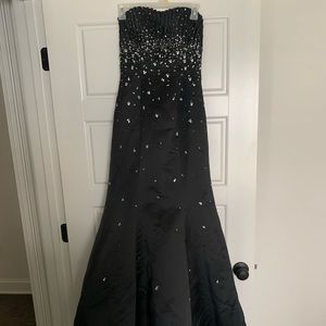 Black mermaid style dress with embellishment
